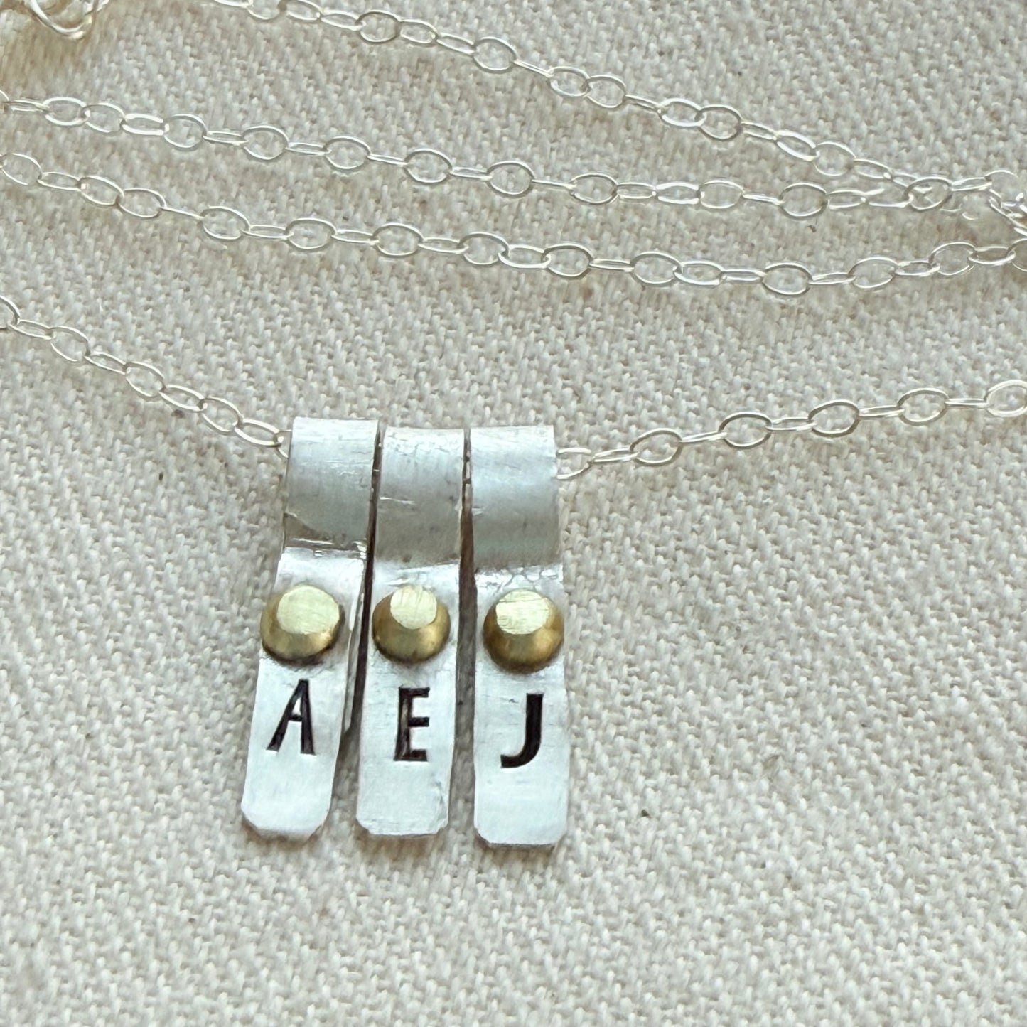 Teeny Tiny Sterling Silver Initial Charm Necklace with Hand Riveted Golden Accents | Art Deco Initial - drake designs jewelry