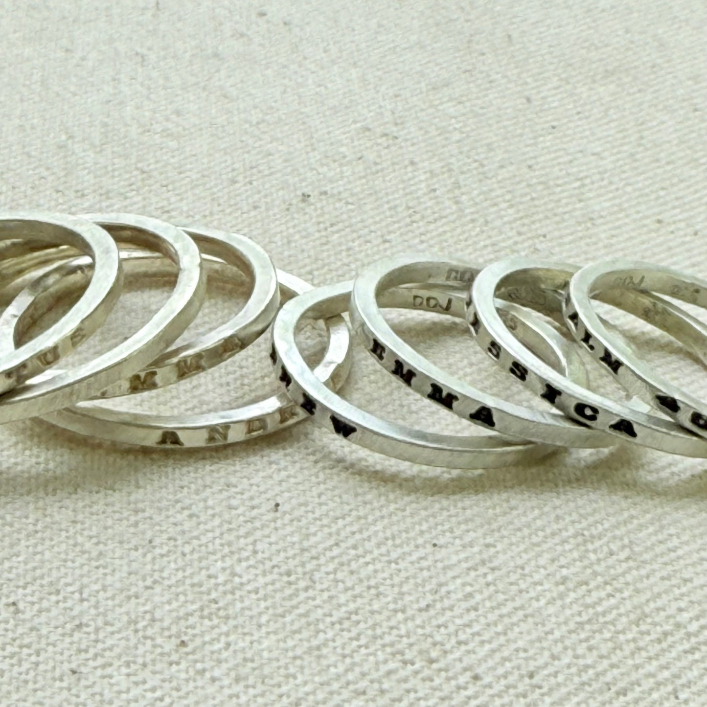 Solid sterling silver dainty but strong rings with custom name, micro mantra or words hand stamped poesy ring - drake designs jewelry