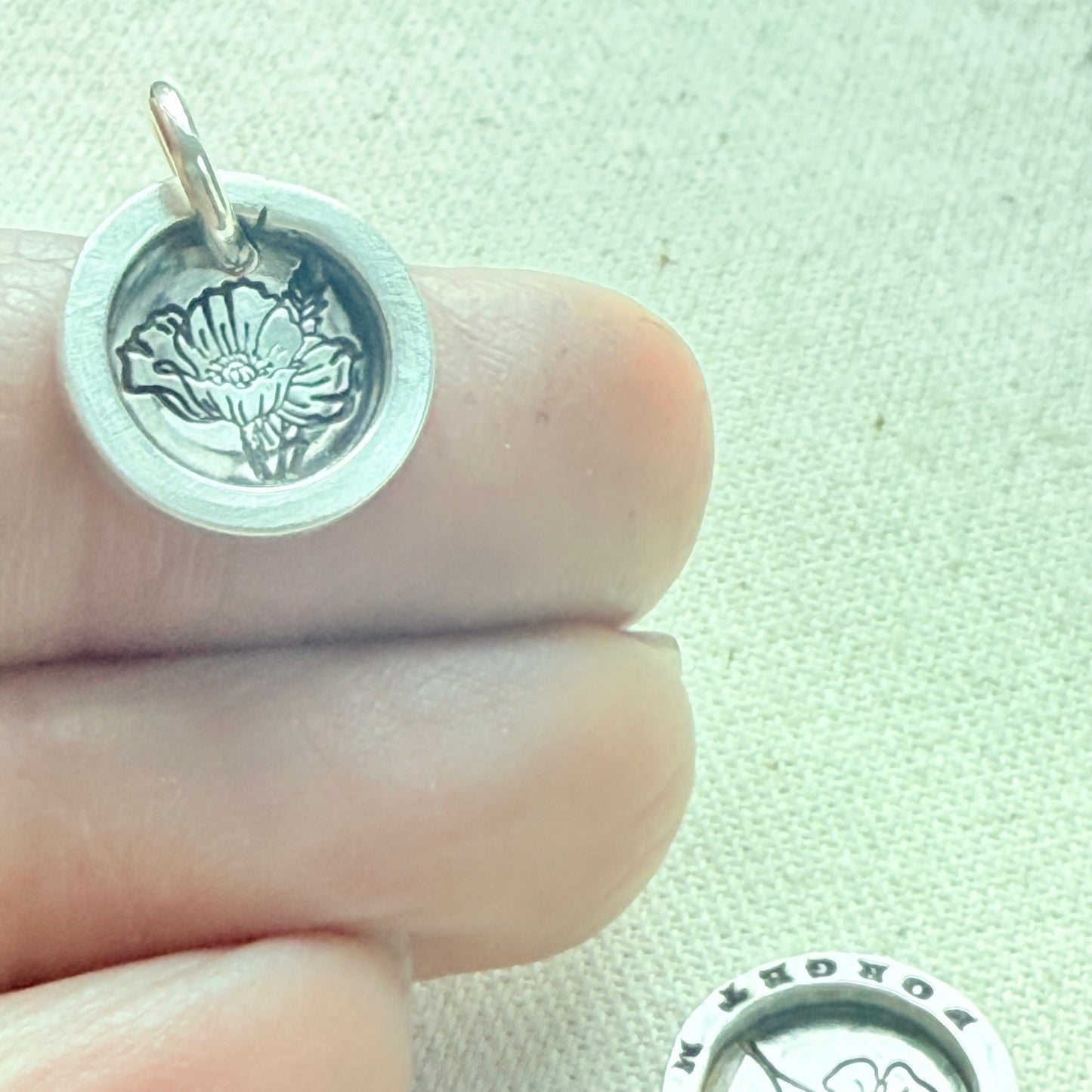poppy flower sterling silver necklace with wax seal style pendant with raised border hand crafted from sterling silver - drake designs jewelry