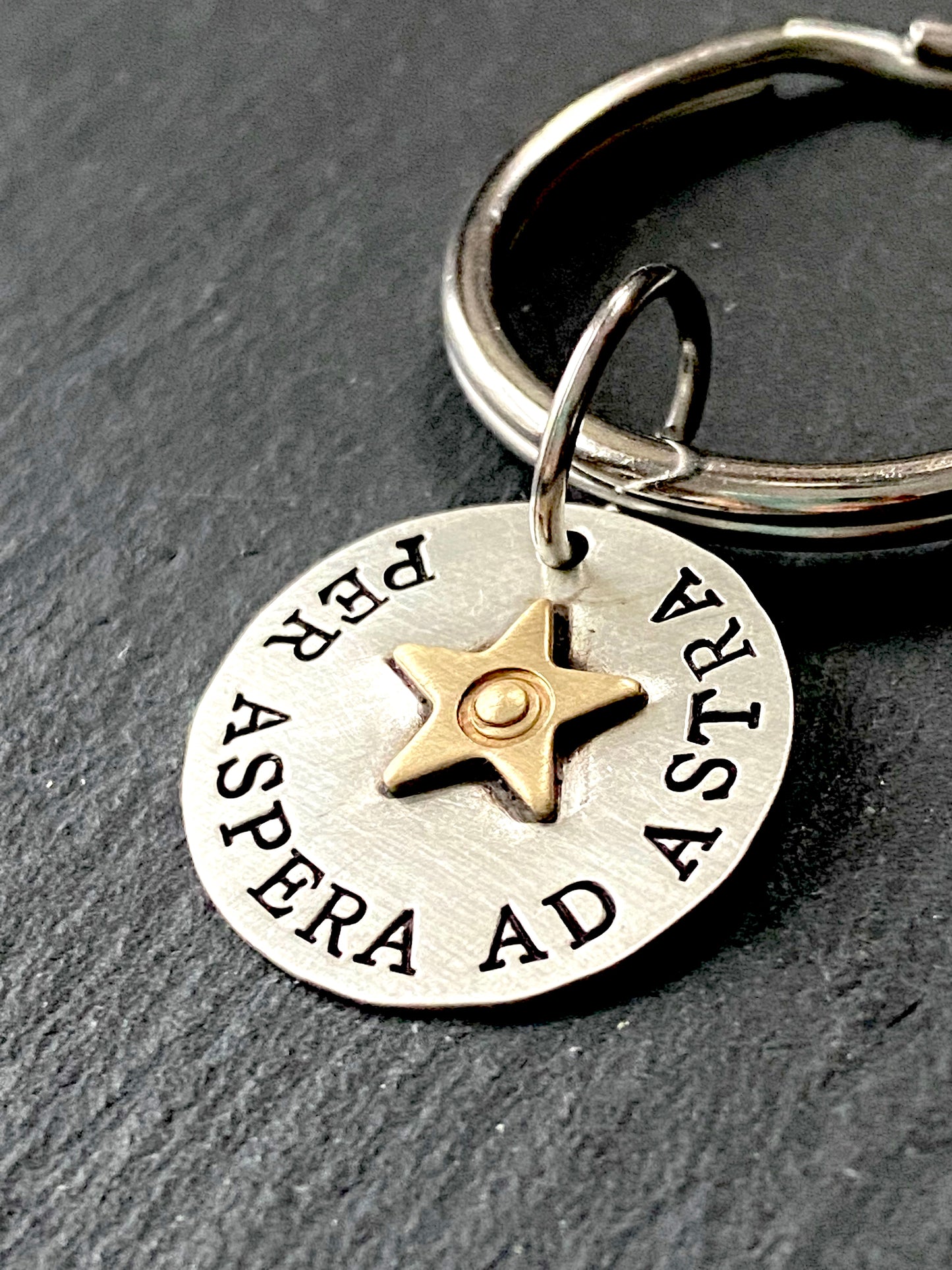 per aspera ad astra. from hardship to the stars. latin phrase keychain sterling silver with gold star. drake designs jewelry