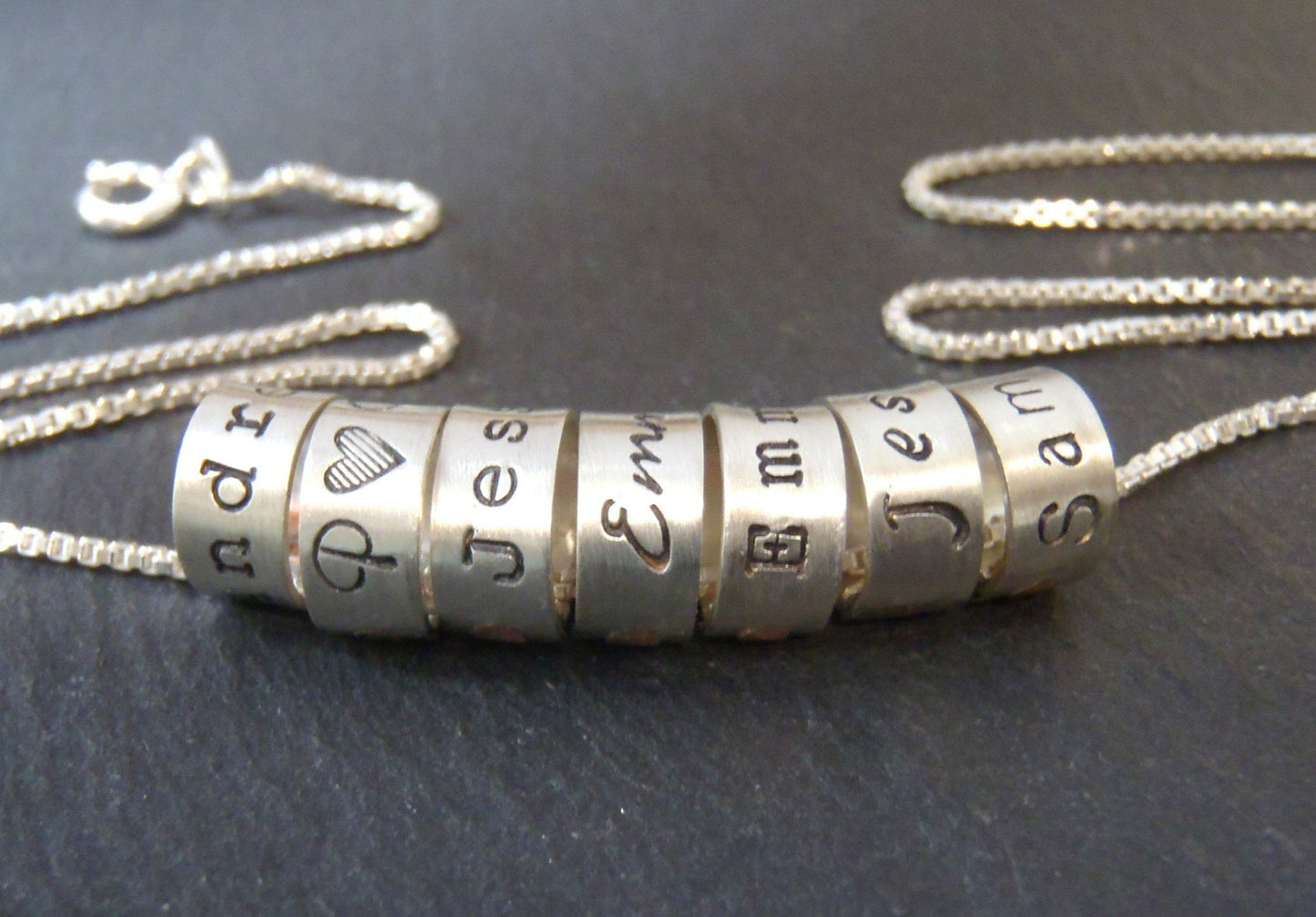 mom necklace with kids names on hand crafted sterling silver ring charms with your choice of font. drake designs jewelry