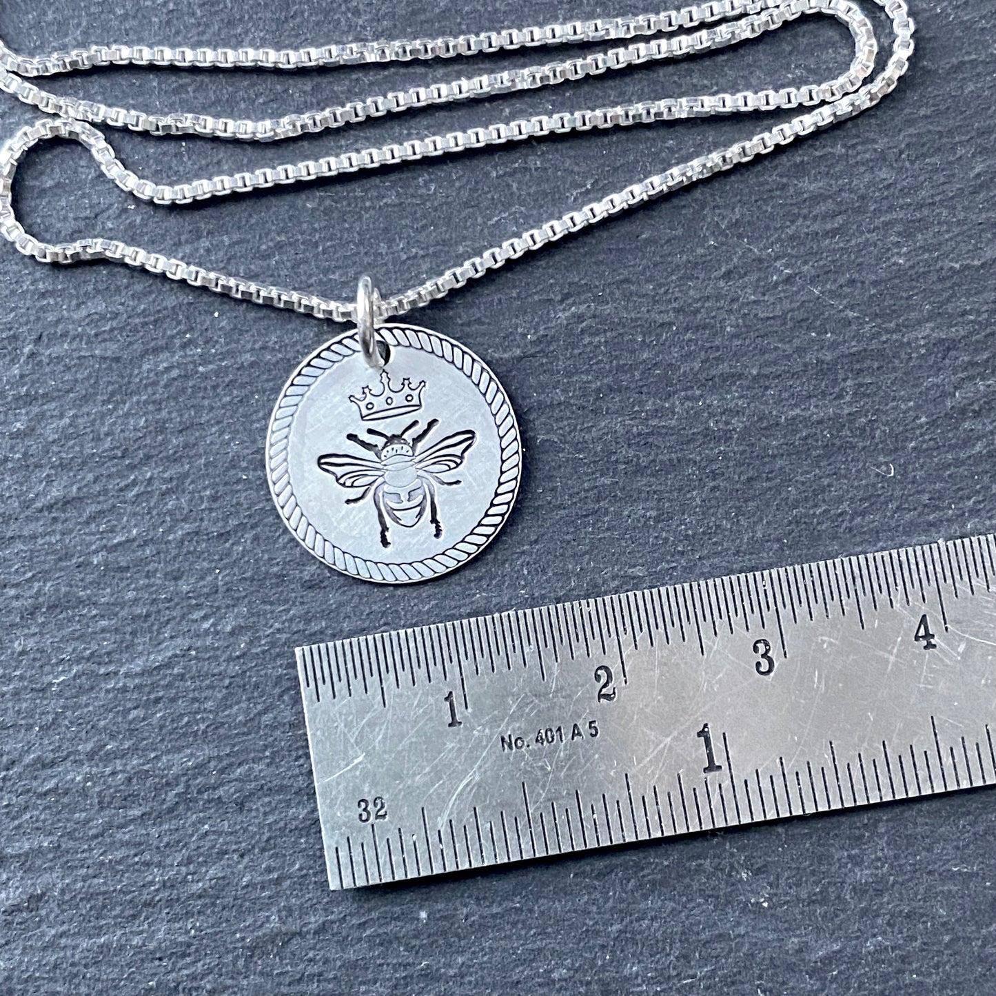 Queen bee necklace with rope edge border. hand stamped on sterling silver. drake designs jewelry