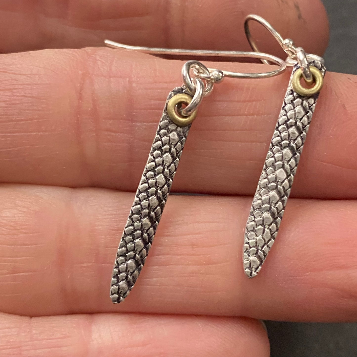 snake print earrings hand crafted from sterling silver and golden brass. snake texture bar dangle earrings. drake designs jewelry