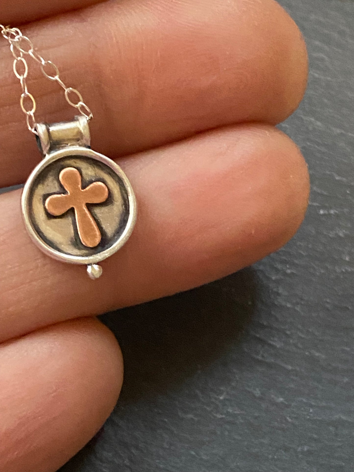 sterling silver cross necklace with raised border and copper cross with raised edge - drake designs jewelry