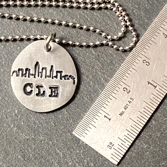 Cleveland skyline necklace hand stamped CLE on organically shaped pewter pendant- Drake Designs Jewelry