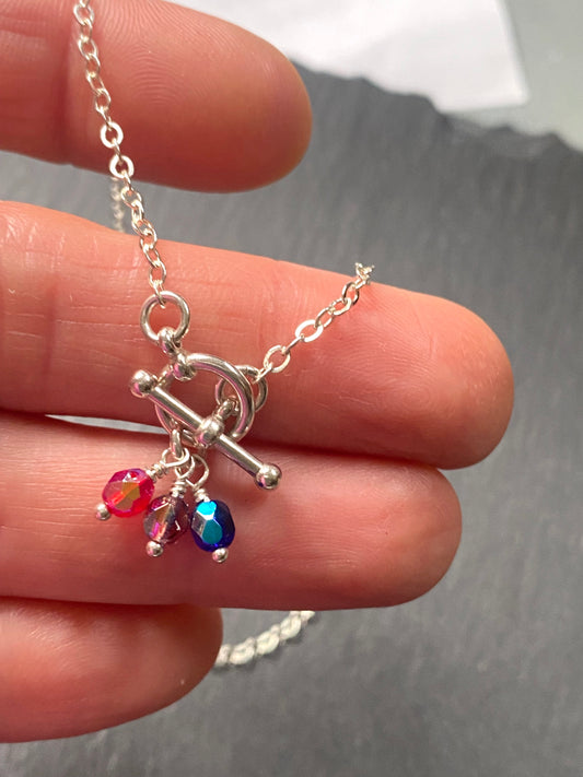 sterling silver toggle clasp mom necklace personalized with kids birthstones. necklace with toggle clasp in front - drake designs jewelry