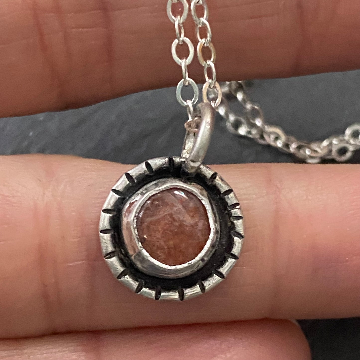 Sterling silver sunstone necklace. Sun with rays created with recycled sterling silver and genuine sunstone is hand set into hand made bezel. Sparkly orange sunstone necklace - drake designs jewelry