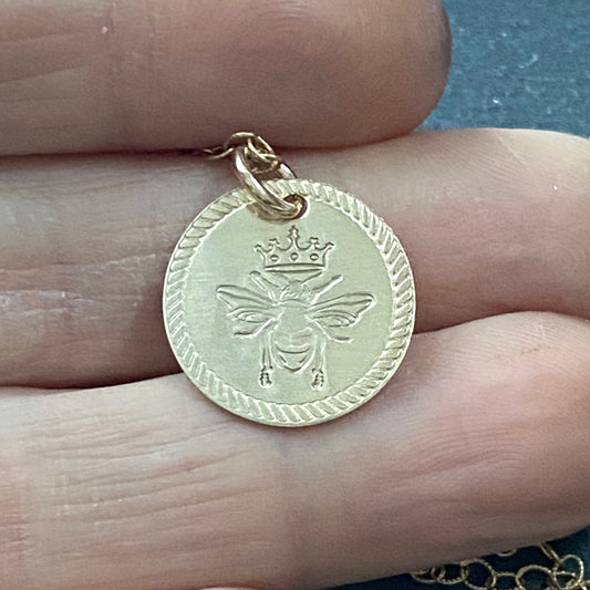 Queen Bee necklace. Bee with crown and Rope edge border are hand stamped on 14k gold filled charm. drake designs jewelry