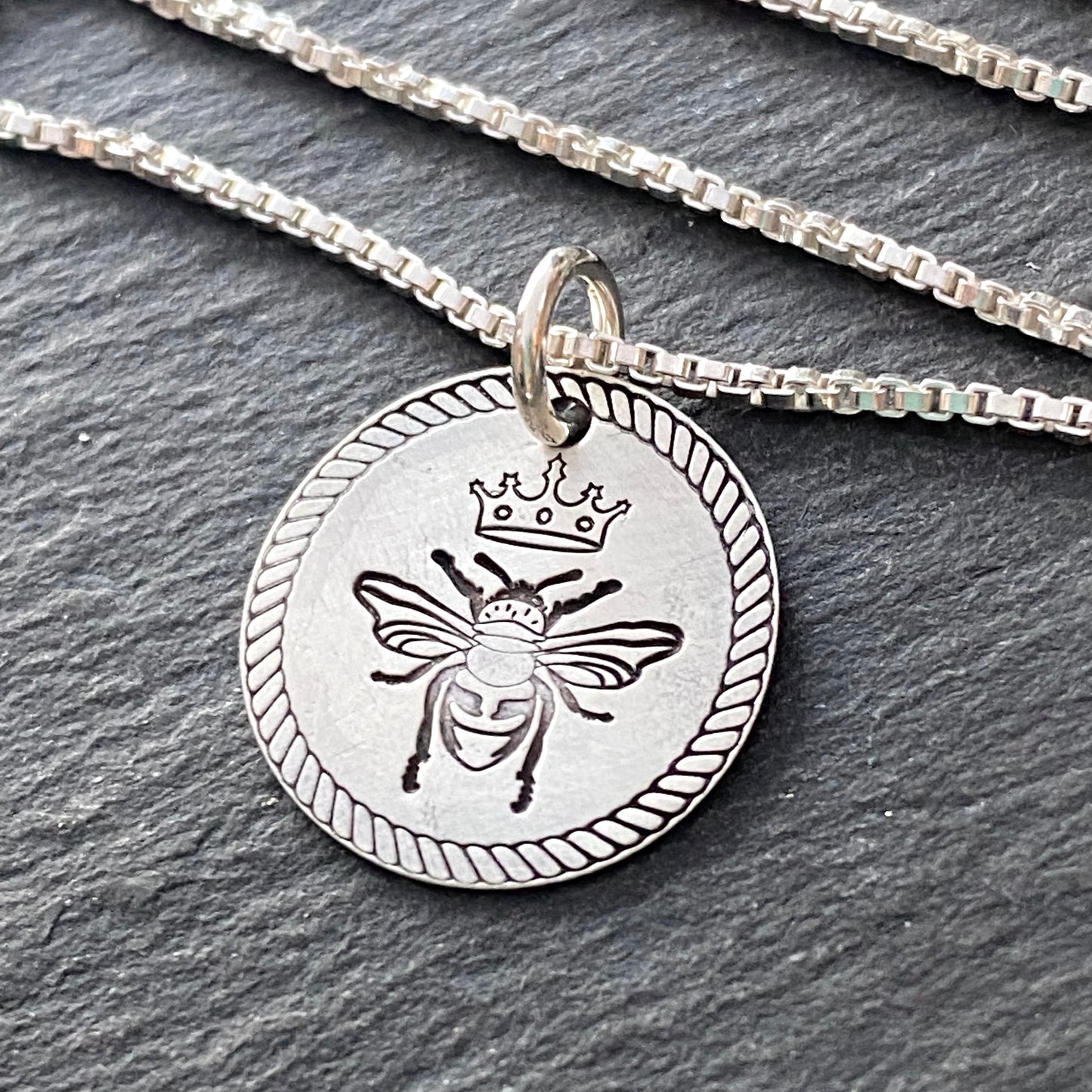 Queen bee necklace with rope border in sterling silver. drake designs jewelry