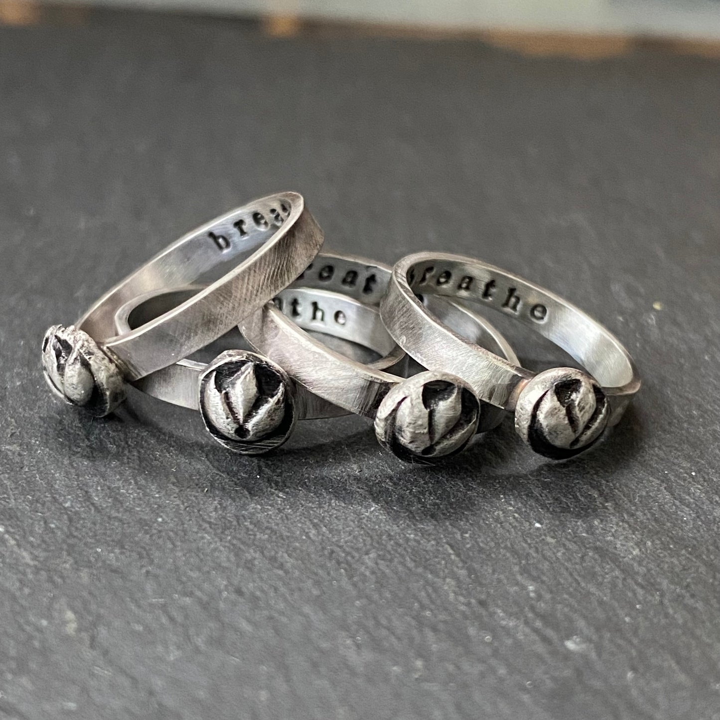 sterling silver lotus flower stacking ring with 'breathe' hand stamped inside, irregular organic shape from melted sterling silver metal - drake designs jewelry
