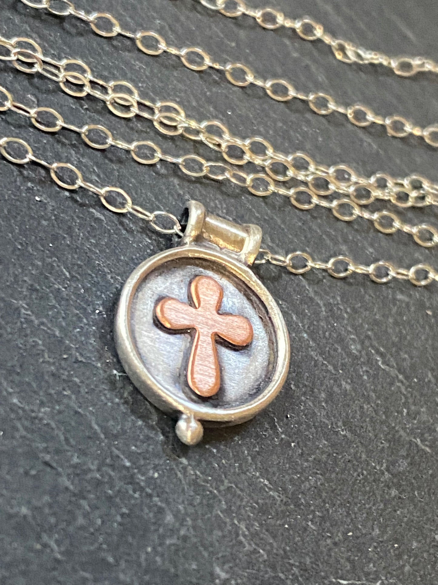 sterling silver cross necklace with raised border bezel and copper cross - drake designs jewelry