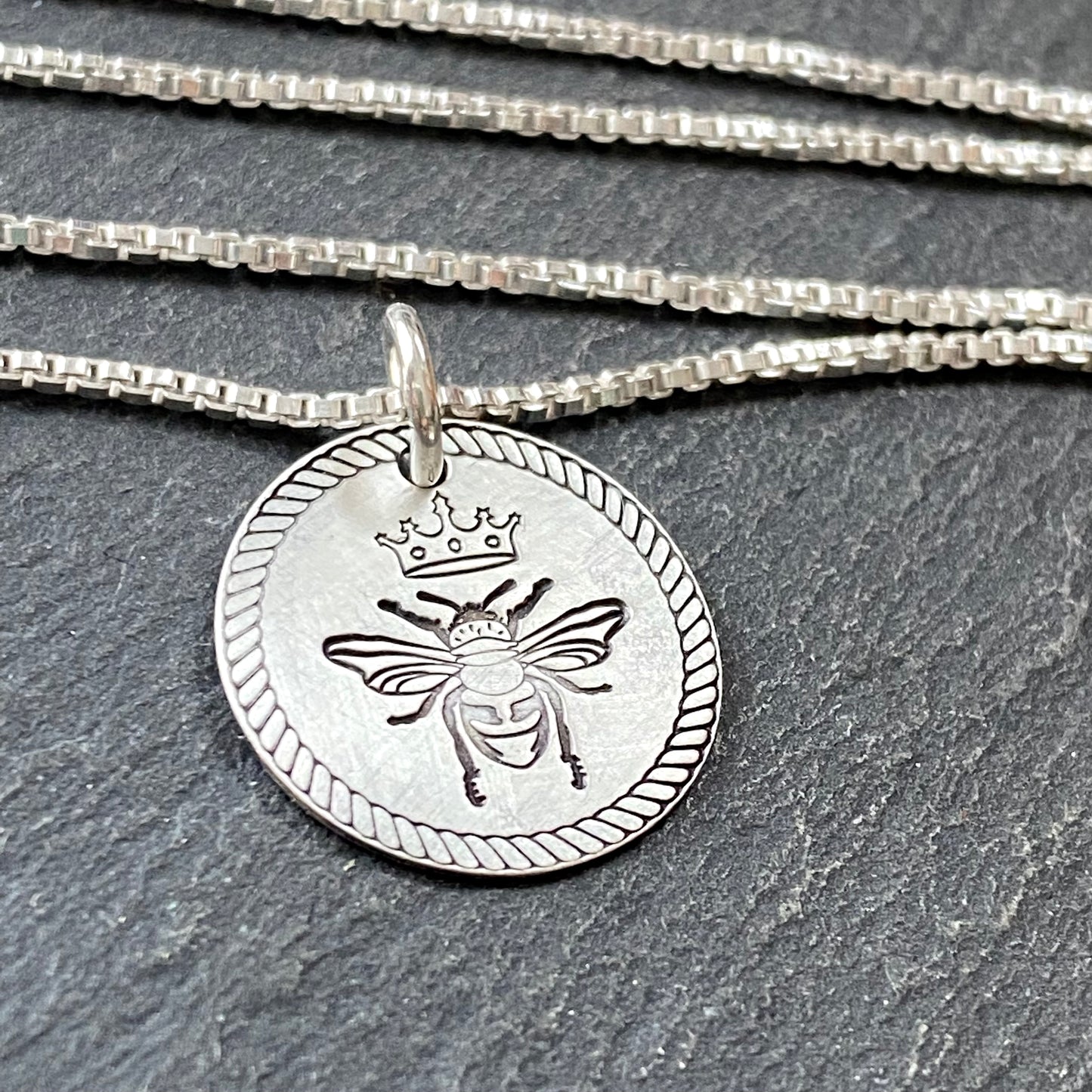 Queen bee necklace hand on sterling silver with a brushed finish. drake designs jewelry