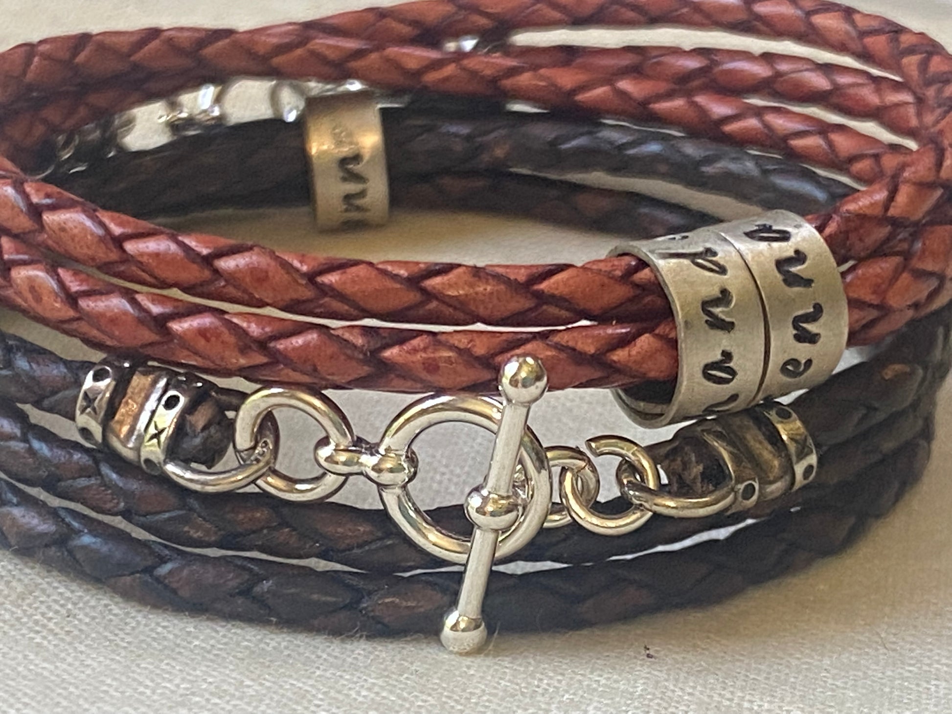 triple wrapped leather bracelet with sterling silver name charms and sterling silver toggle clasp. personalized bracelet with kids names - drake designs jewelry