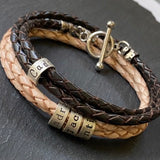 braided leather bracelet with toggle clasp and personalized sterling silver name charms. 4mm braided leather - drake designs jewelry