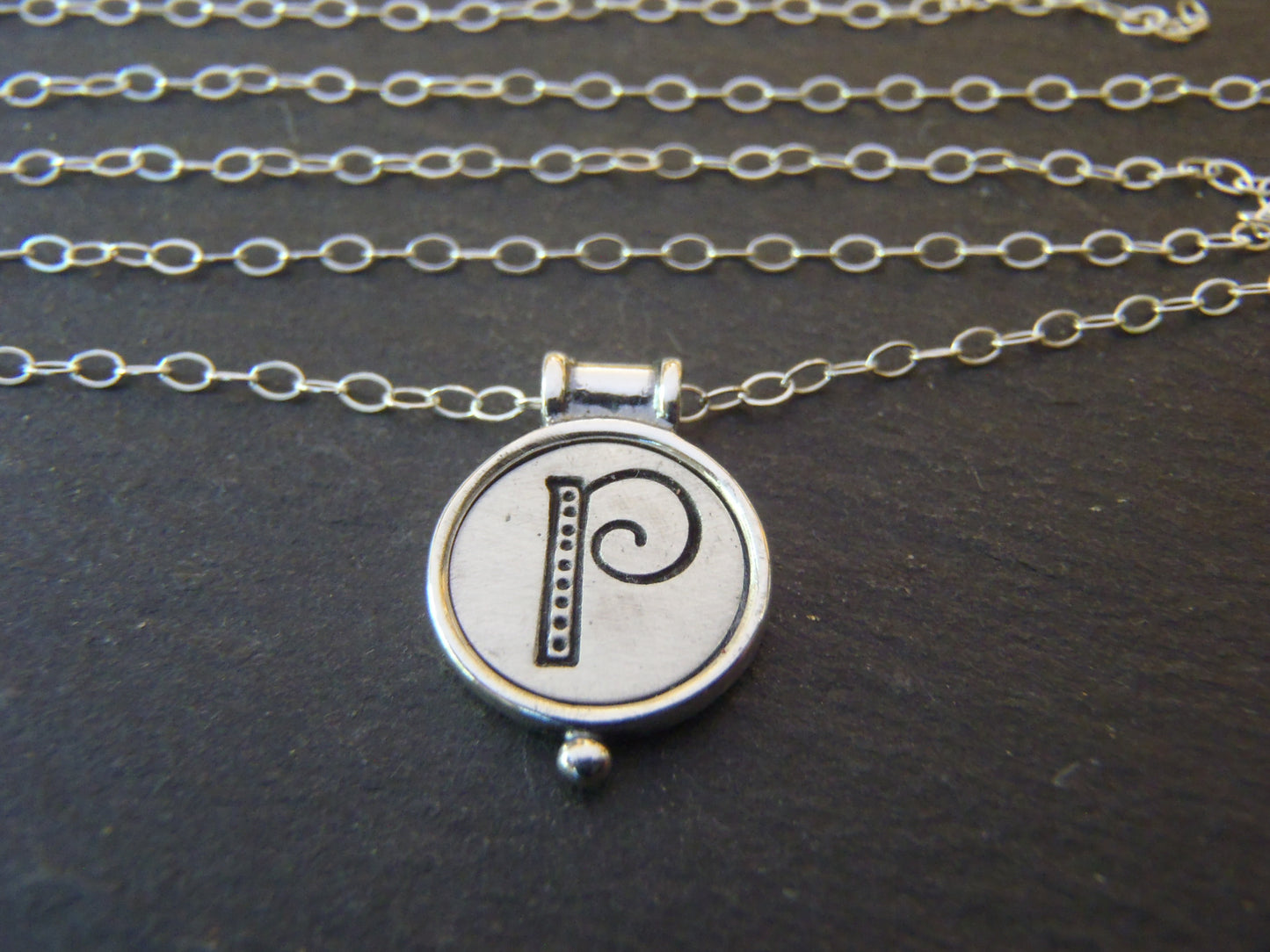 whimsical initial necklace with raised edge in sterling silver - drake designs jewelry
