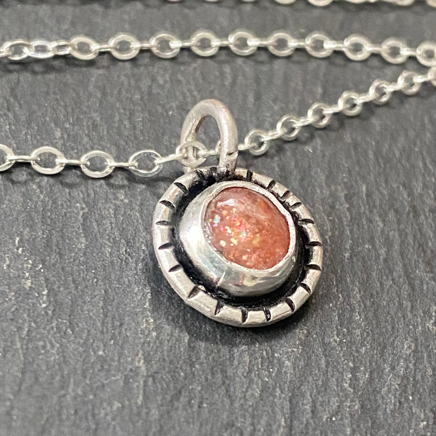 Sterling silver sunstone necklace. Sun with rays created with recycled sterling silver and genuine sunstone is hand set into hand made bezel. Sparkly orange sunstone necklace - drake designs jewelry