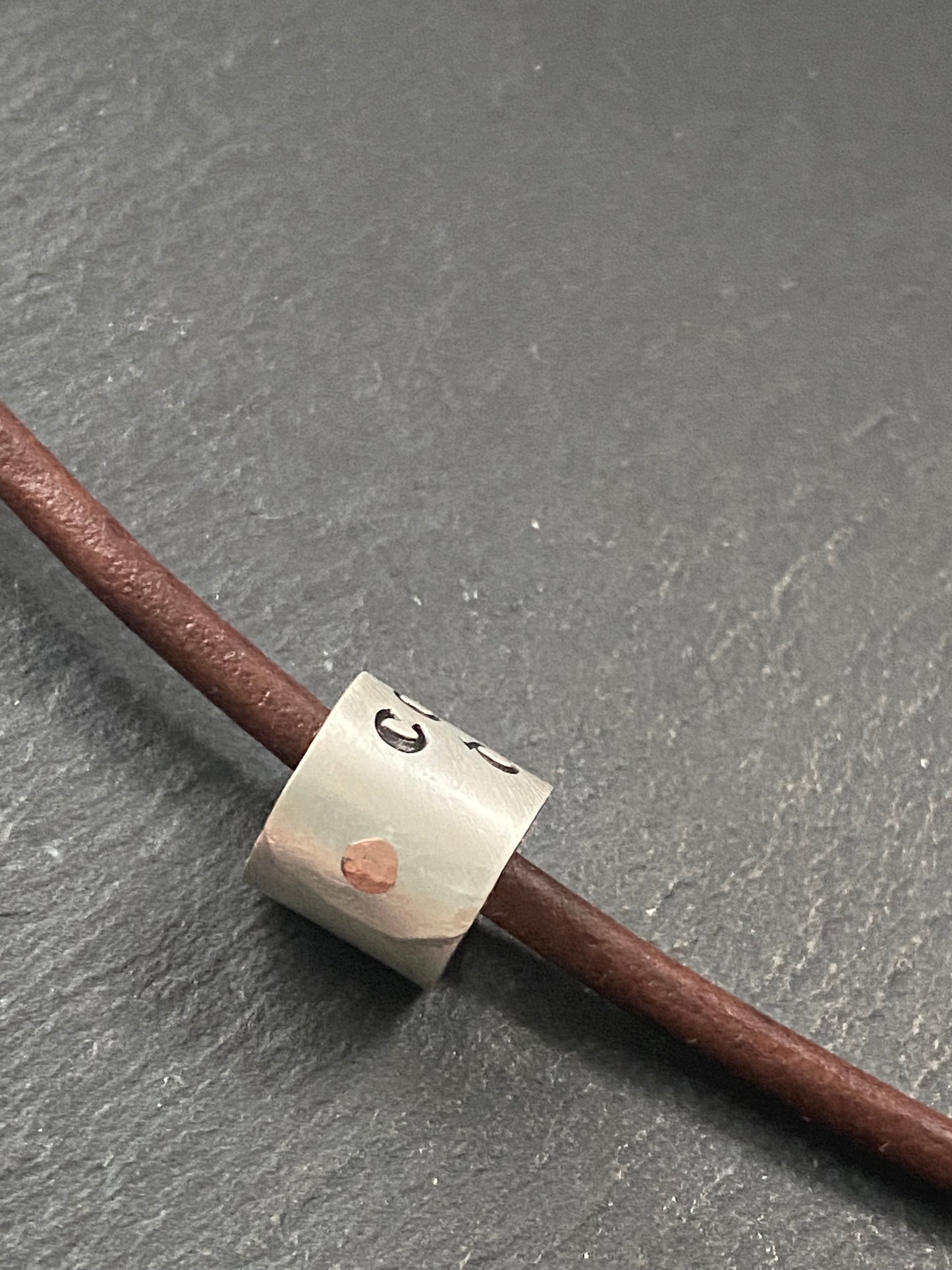 Carpe Diem sterling silver tube pendant on leather cord necklace. celtic font. drake designs jewelry