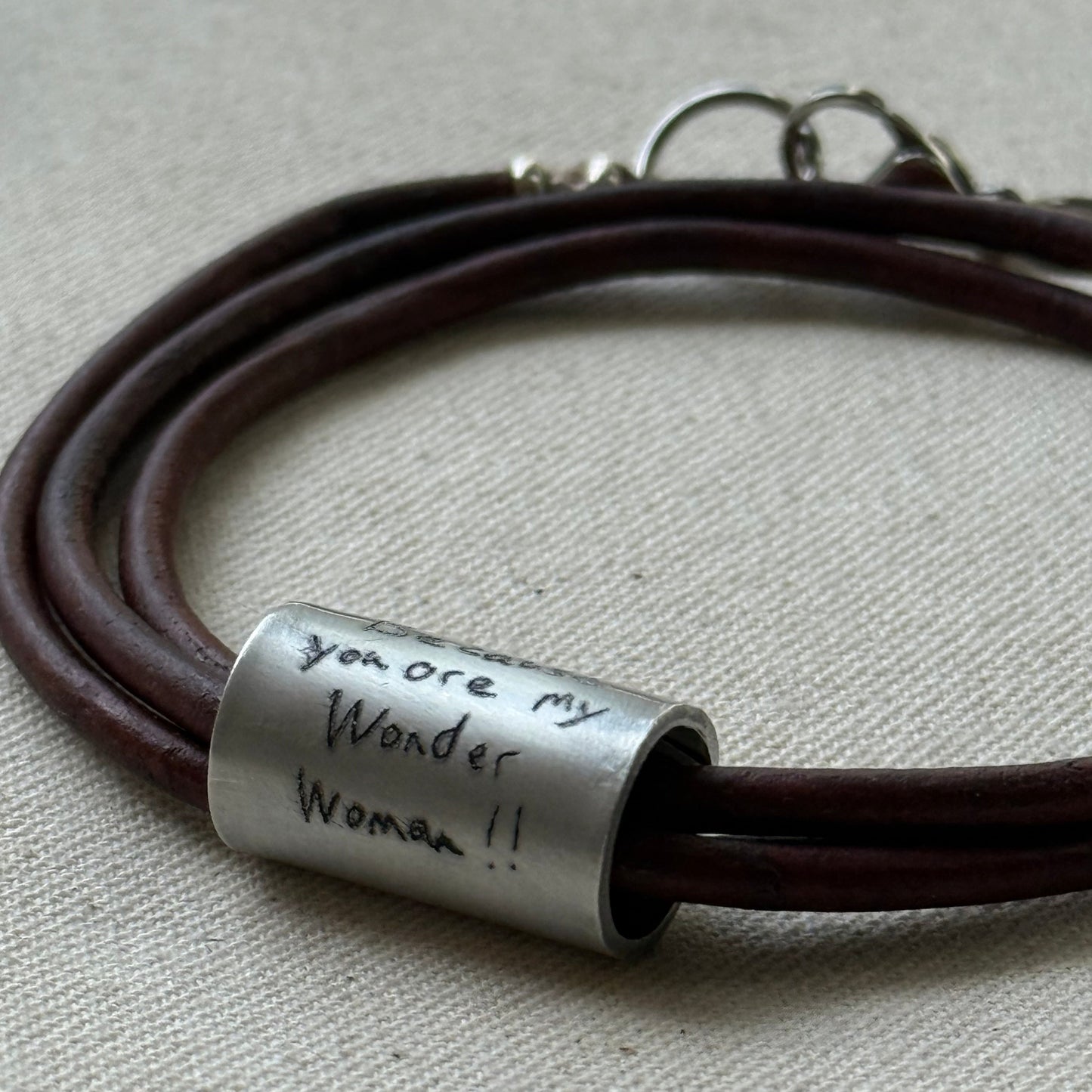 Leather bracelet with cylindrical pendant engraved with loved ones actual handwriting. - drake designs jewelry