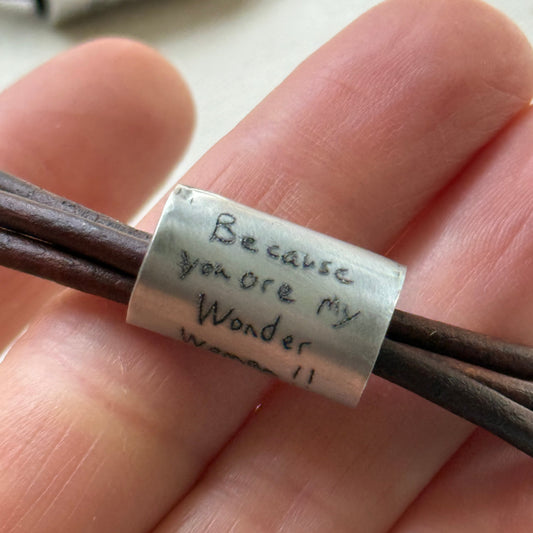 Leather bracelet with cylindrical pendant engraved with loved ones actual handwriting. - drake designs jewelry