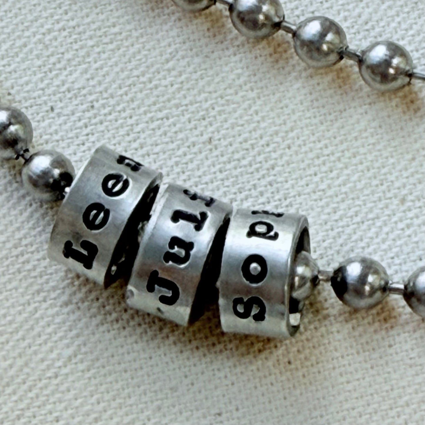 personalized silver name charm necklace for men and women - hand stamped with kids names in your choice of font - pewter charms on stainless steel ball chain necklace -drake designs jewelry