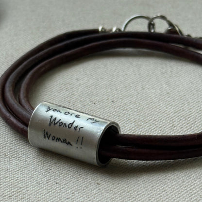 Leather bracelet with cylindrical pendant engraved with loved ones actual handwriting. - drake designs jewelry