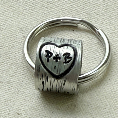 traditional 10th tin anniversary gift - tree textured with heart and initials carved tenth anniversary gift - drake designs jewelry