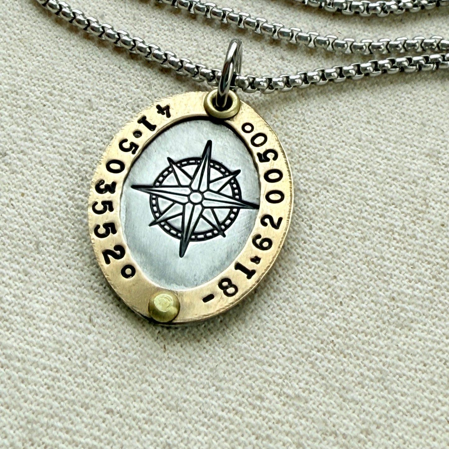 Gold rimmed compass necklace with custom coordinates - oval pendant with compass rose at center-  hand stamped and riveted by hand - drake designs jewelry