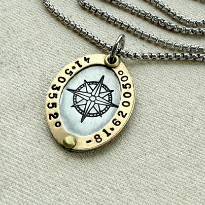 Oval Gold Rimmed custom coordinates necklace with compass rose at center hand stamped and riveted by hand - drake designs jewelry
