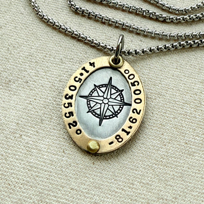 Gold Rimmed custom coordinates oval pendant necklace with compass rose at center hand stamped and riveted by hand - drake designs jewelry