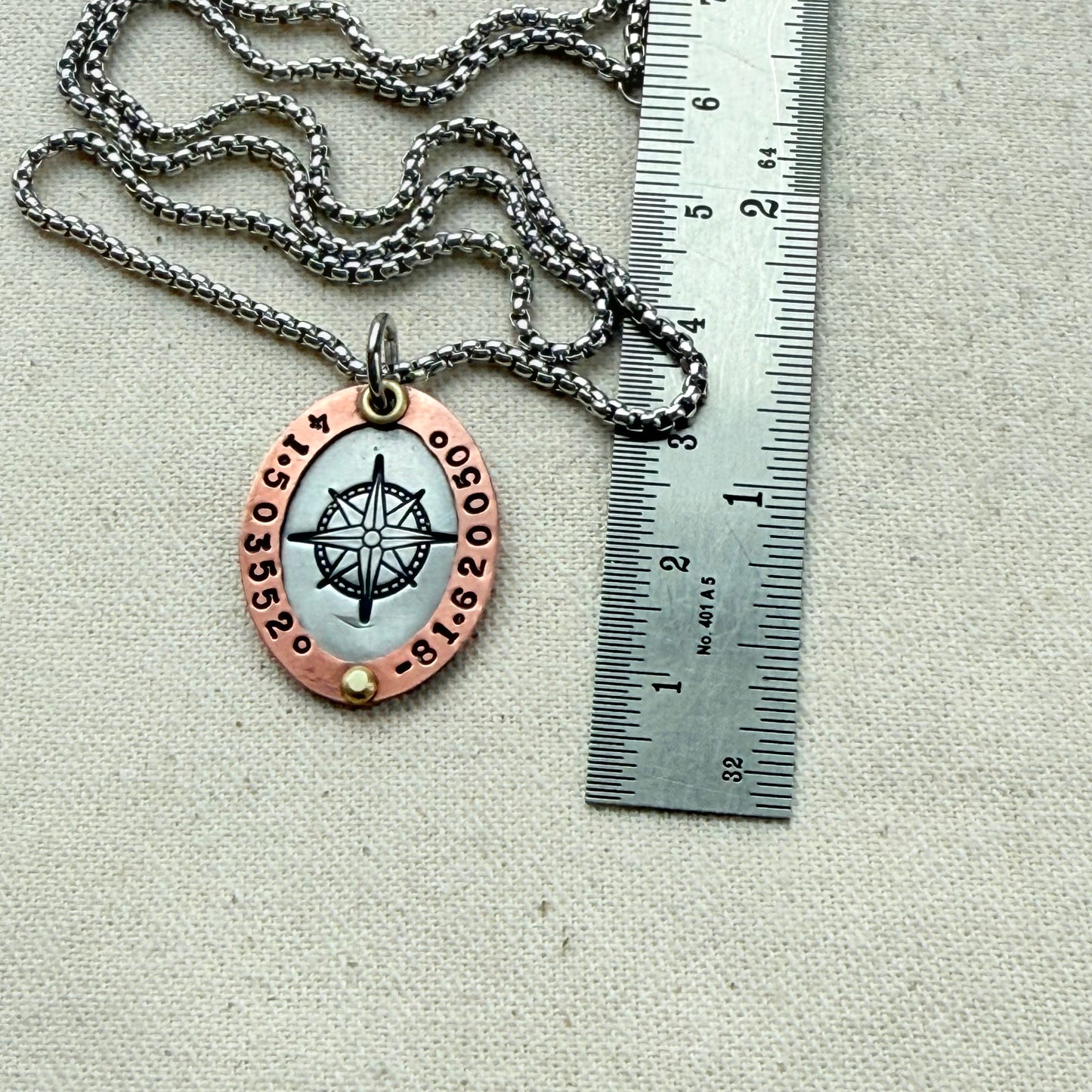 Personalized Compass Necklace with Custom Latitude and Longitude - Oval Pendant with Raised Copper Border | Drake Designs Jewelry