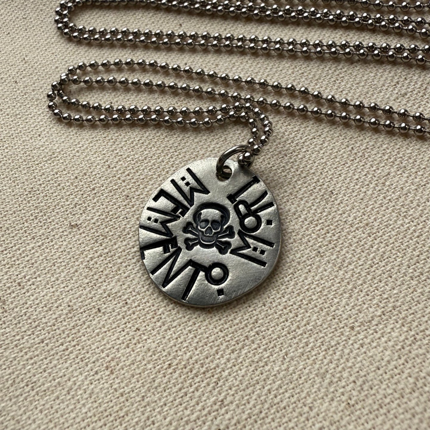 Memento mori Latin Phrase Necklace with skull and crossbones. Hand-stamped_ Drake designs jewelry