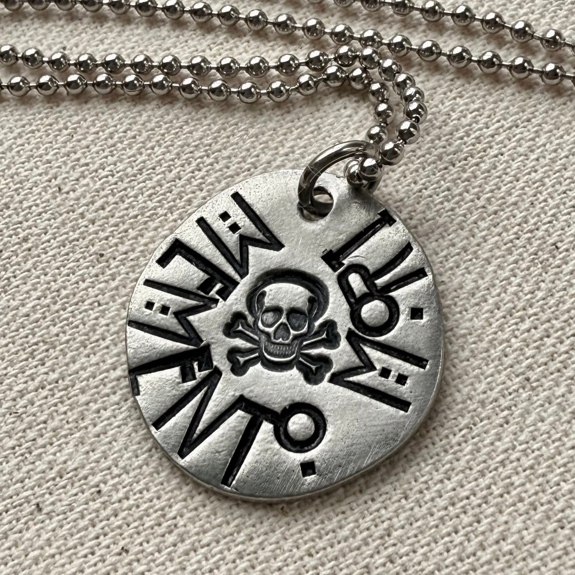 Memento mori Latin Phrase Necklace with skull and crossbones. Hand-stamped_ Drake designs jewelry