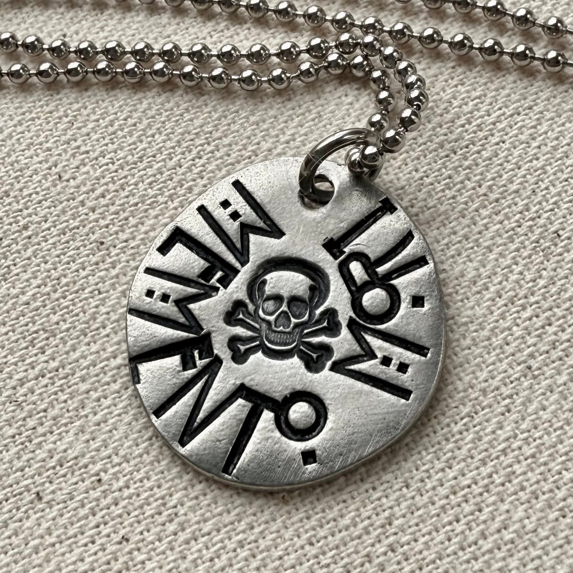 Memento mori Latin Phrase Necklace with skull and crossbones. Hand-stamped_ Drake designs jewelry