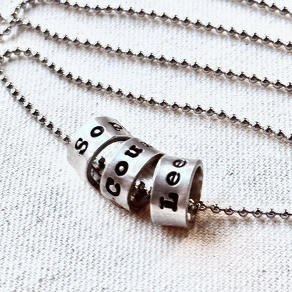 personalized silver name charm necklace for men and women - hand stamped with kids names in your choice of font - drake designs jewelry