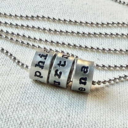 personalized necklace with childrens names for men and women - hand stamped on silver charms personalized in choice of font - drake designs jewelry