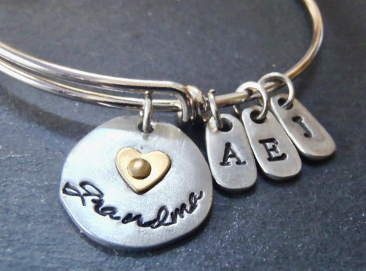 Personalized grandma bracelet - mixed metal adjustable bangle with grandkids initials and gold heart on Grandma charm - Drake Designs Jewelry