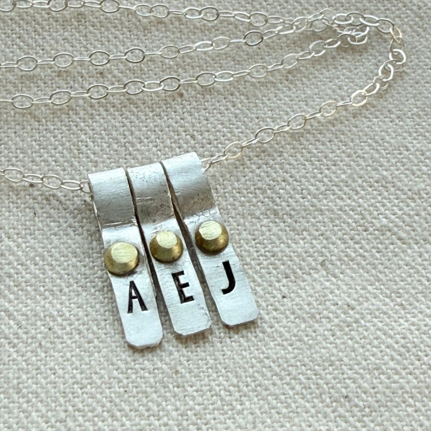Teeny Tiny Sterling Silver Initial Charm Necklace with Hand Riveted Golden Accents | Art Deco Initial - drake designs jewelry