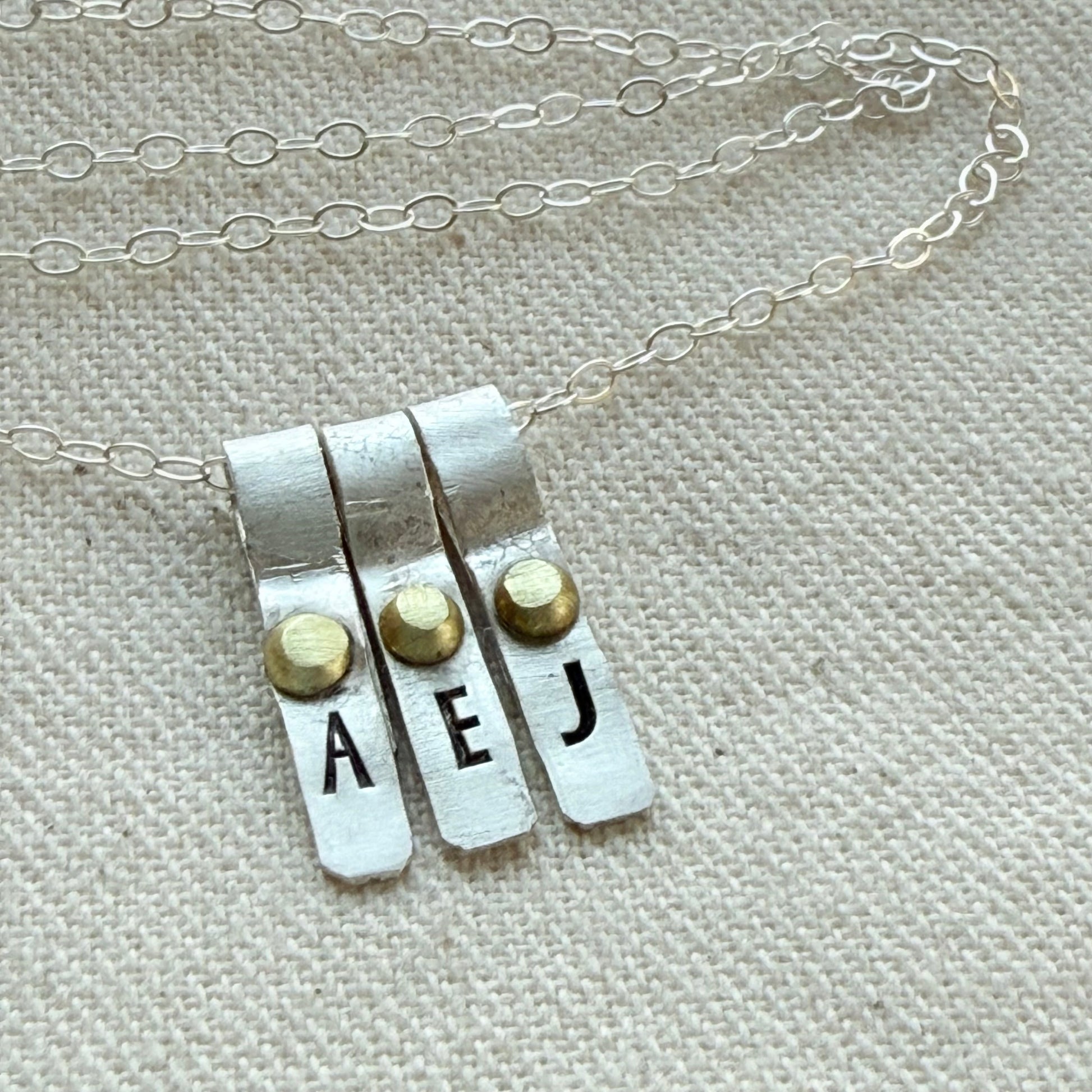 Teeny Tiny Sterling Silver Initial Charm Necklace with Hand Riveted Golden Accents | Art Deco Initial - drake designs jewelry