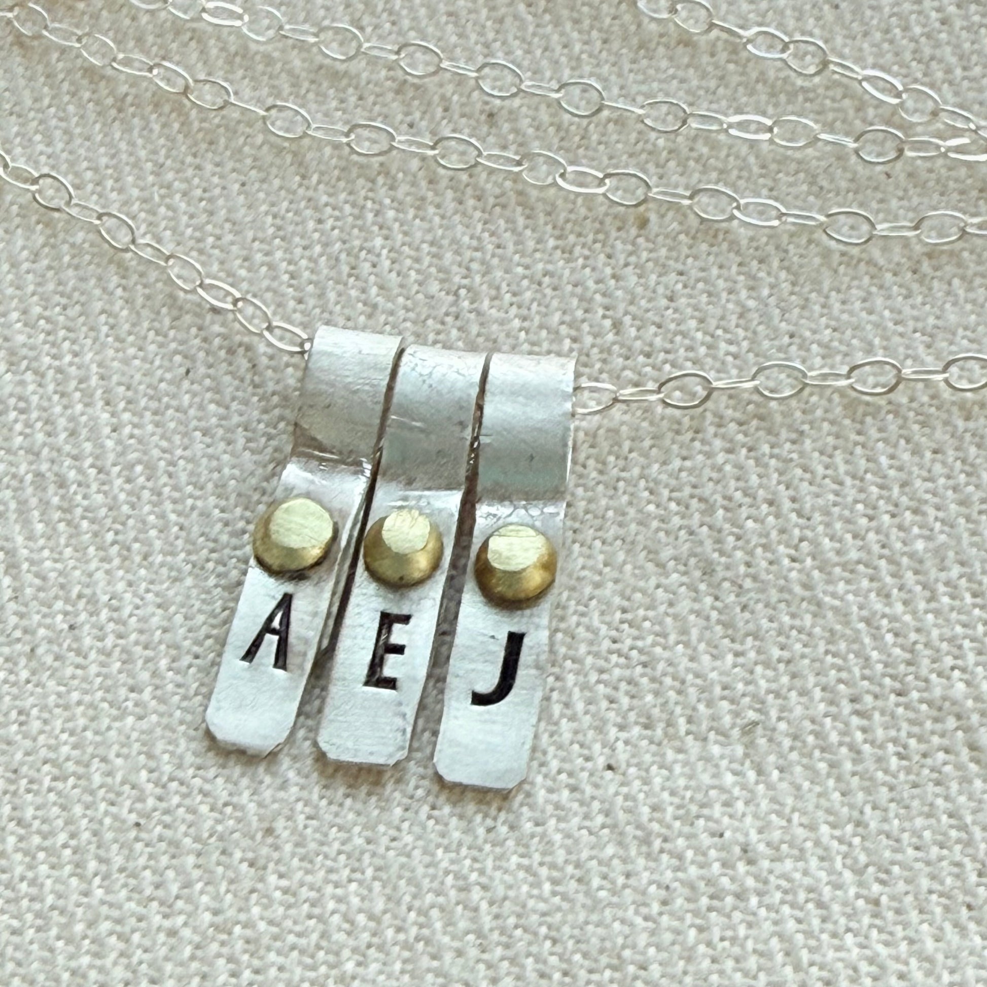 Teeny Tiny Sterling Silver Initial Charm Necklace with Hand Riveted Golden Accents | Art Deco Initial - drake designs jewelry