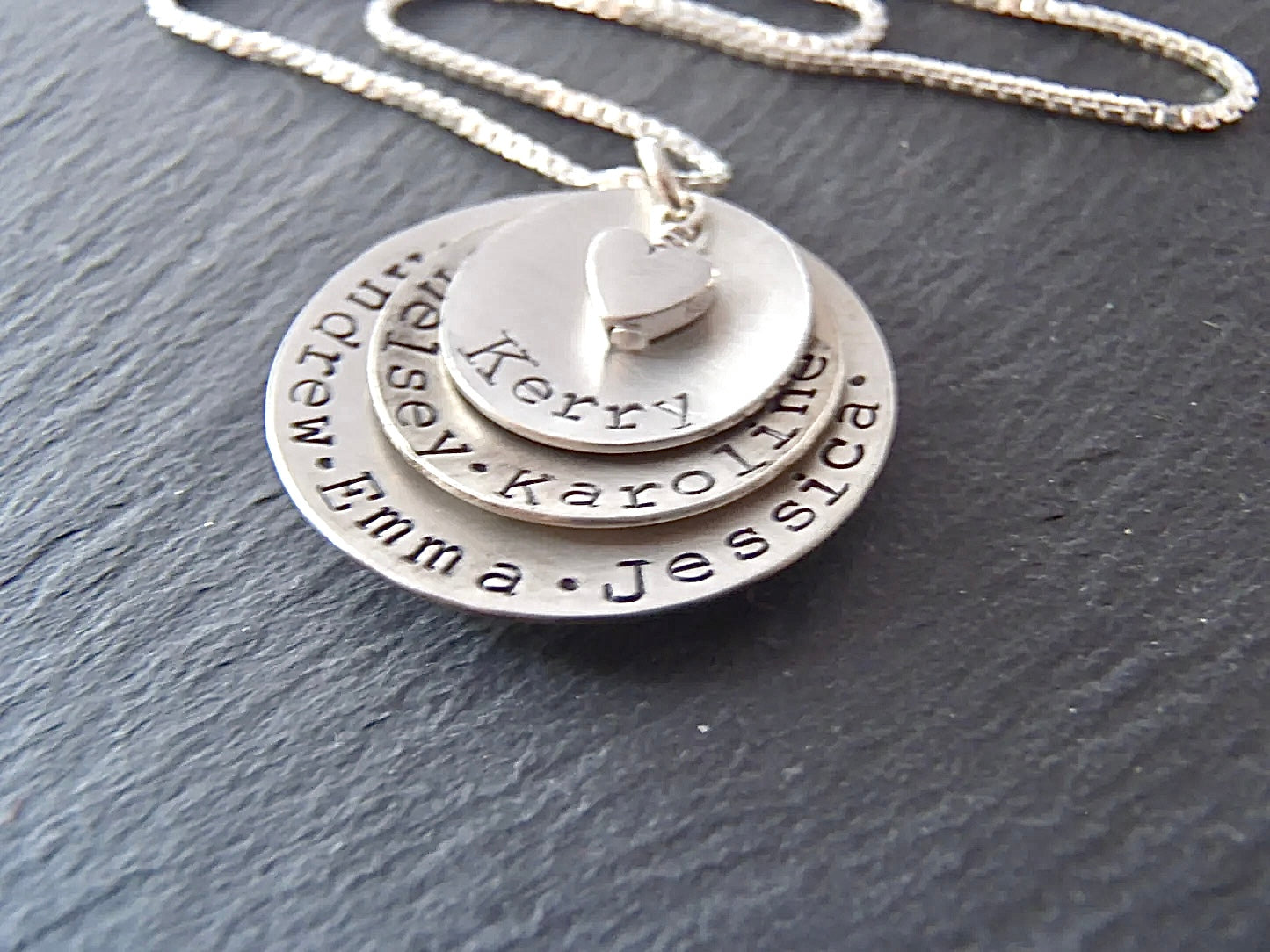 Layered mom necklace with names. Hand crafted from solid Sterling silver, slightly concave with a heart nestled at the center - Drake Designs Jewelry