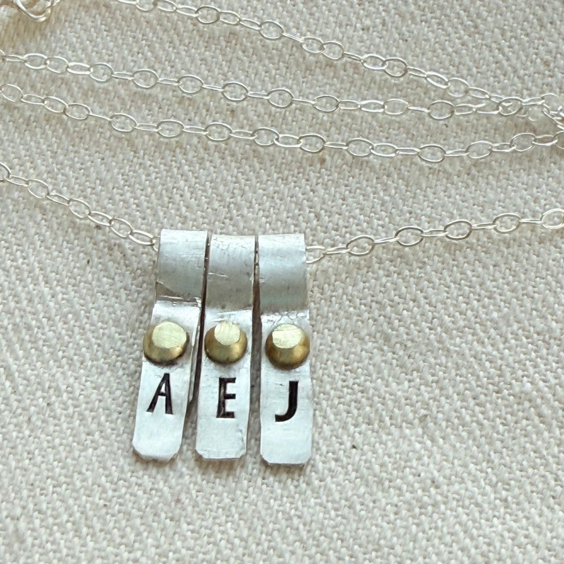 Teeny Tiny Sterling Silver Initial Charm Necklace with Hand Riveted Golden Accents | Art Deco Initial - drake designs jewelry