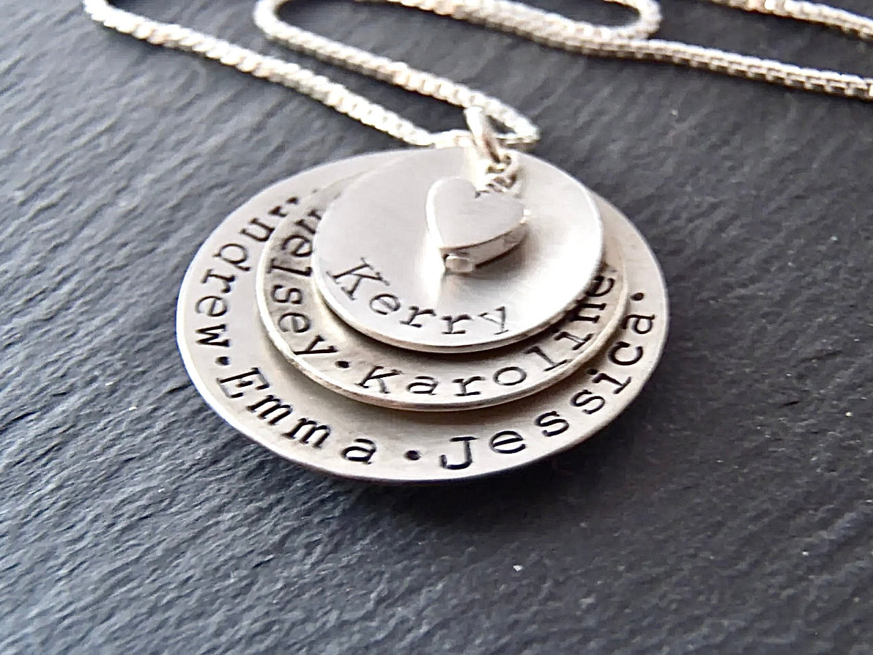 Layered mom necklace with names. Hand crafted from solid Sterling silver, slightly concave with a heart nestled at the center - Drake Designs Jewelry