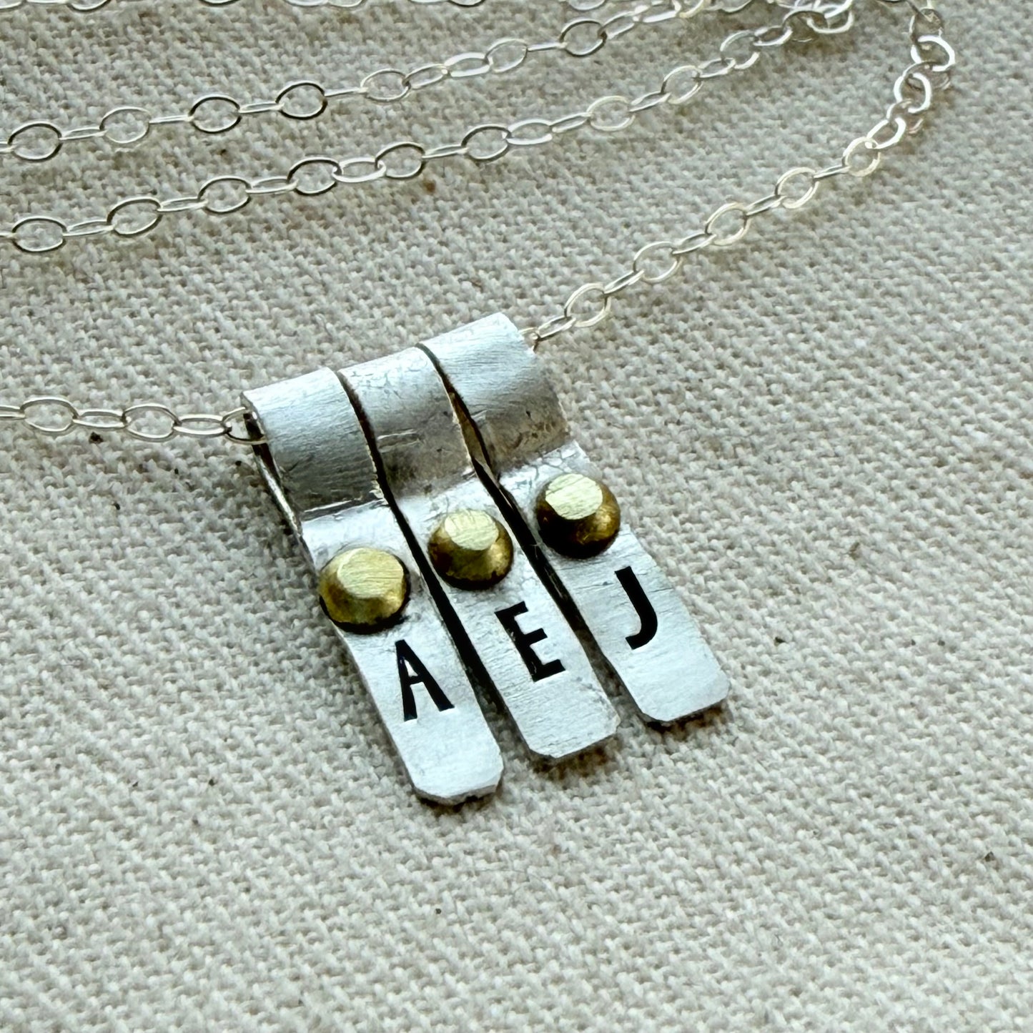 Teeny Tiny Sterling Silver Initial Charm Necklace with Hand Riveted Golden Accents | Art Deco Initial - drake designs jewelry