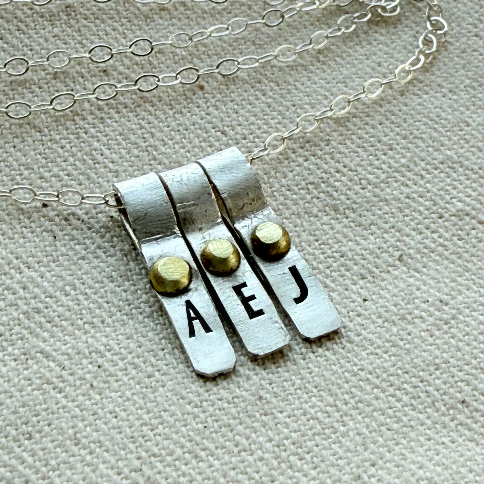Teeny Tiny Sterling Silver Initial Charm Necklace with Hand Riveted Golden Accents | Art Deco Initial - drake designs jewelry