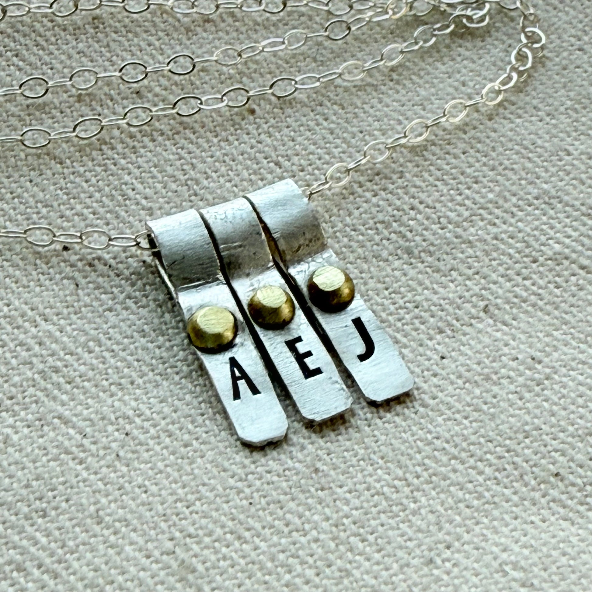 Teeny Tiny Sterling Silver Initial Charm Necklace with Hand Riveted Golden Accents | Art Deco Initial - drake designs jewelry
