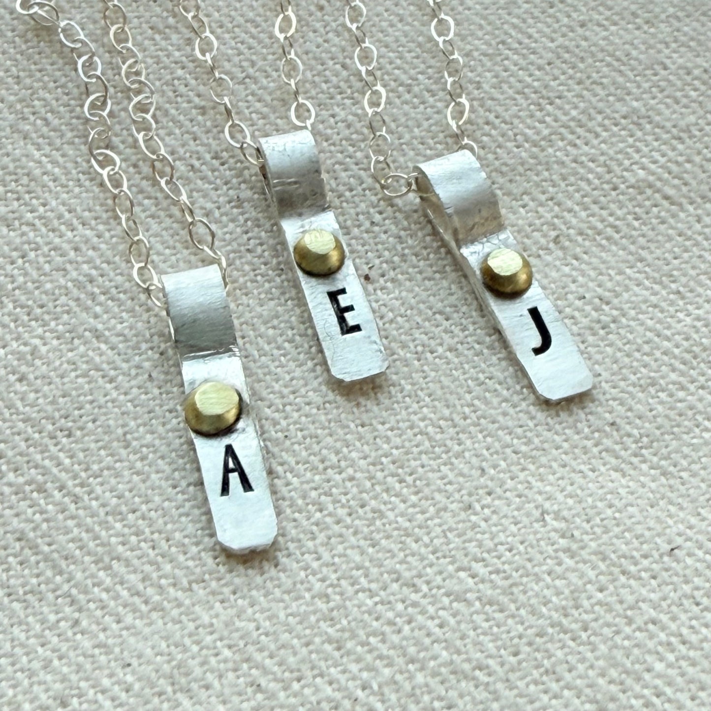 Teeny Tiny Sterling Silver Initial Charm Necklace with Hand Riveted Golden Accents | Art Deco Initial - drake designs jewelry