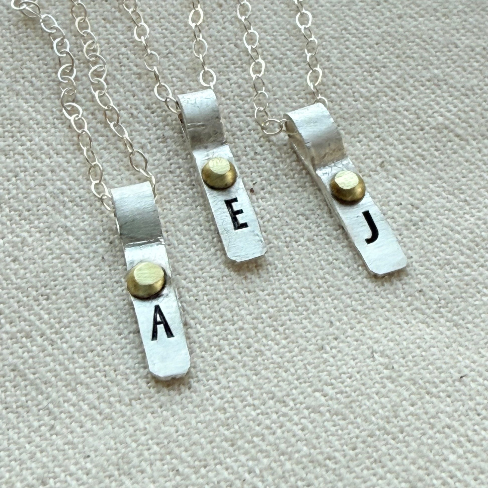 Teeny Tiny Sterling Silver Initial Charm Necklace with Hand Riveted Golden Accents | Art Deco Initial - drake designs jewelry