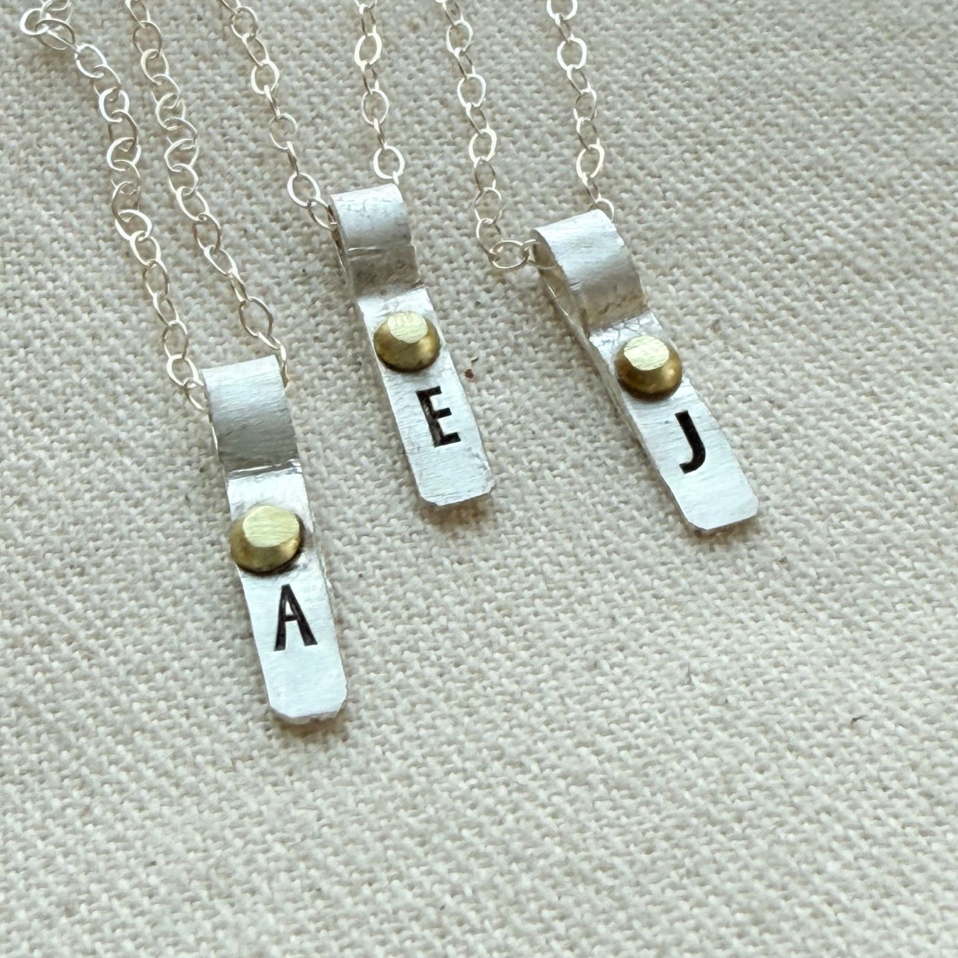 Teeny Tiny Sterling Silver Initial Charm Necklace with Hand Riveted Golden Accents | Art Deco Initial - drake designs jewelry