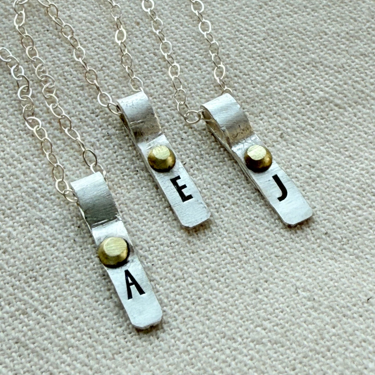 Teeny Tiny Sterling Silver Initial Charm Necklace with Hand Riveted Golden Accents | Art Deco Initial - drake designs jewelry