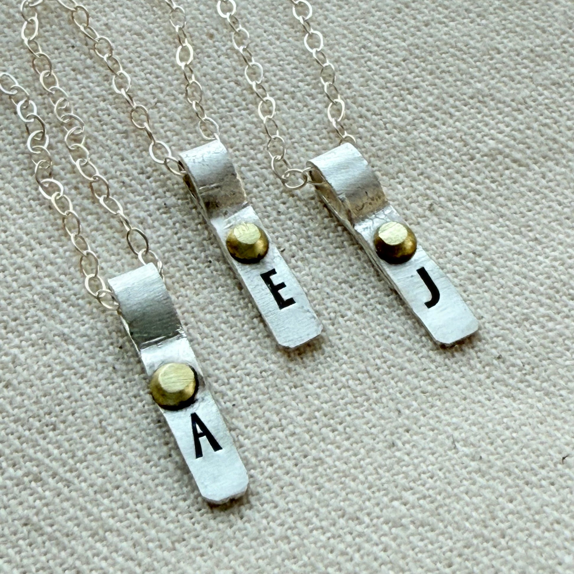 Teeny Tiny Sterling Silver Initial Charm Necklace with Hand Riveted Golden Accents | Art Deco Initial - drake designs jewelry